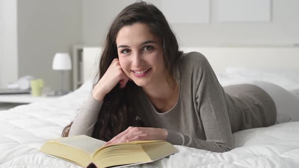 Woman reading in bed