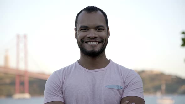 Happy Young Man Looking at Camera