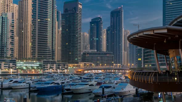 Dubai Marina at Blue Hour Night to Day Timelapse with Yachts