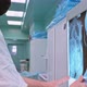 Surgeon Examining Xray of Patient's Spine in Operating Room - VideoHive Item for Sale