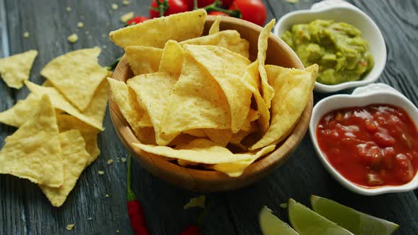 Nachos and Sauces on Table 