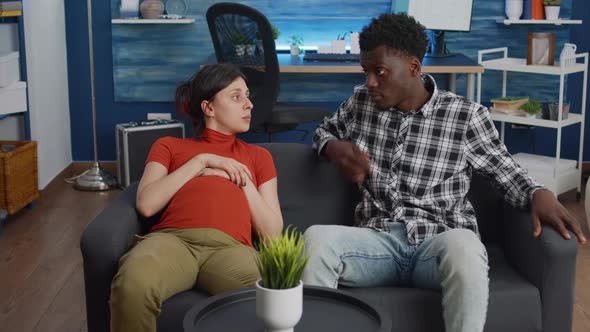 Interracial Couple Talking About Child and Parenthood