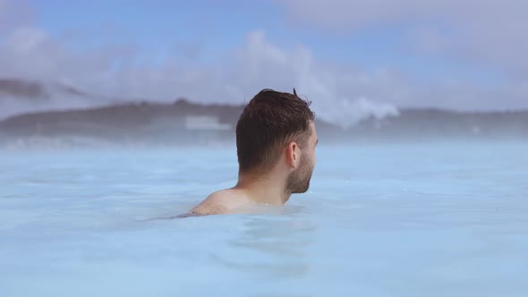 Young Man In Geothermal Spa Lagoon