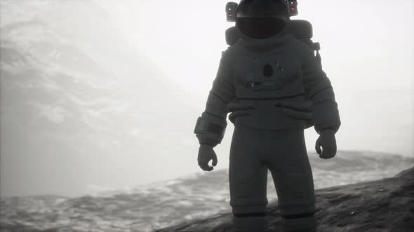 Astronaut on Another Planet with Dust and Fog