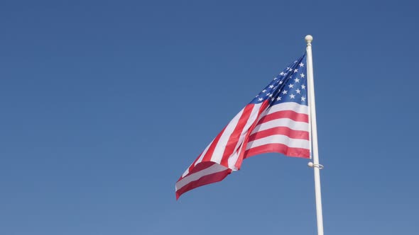 Famous American flag fabric waving on the wind  by the day 4K  2160p 30fps  UHD footage - United Sta