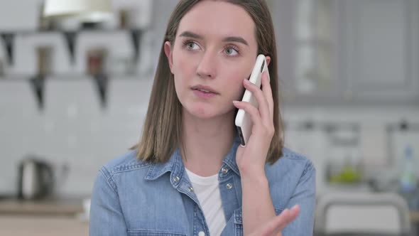 Portrait of Beautiful Young Creative Woman Talking on Smartphone