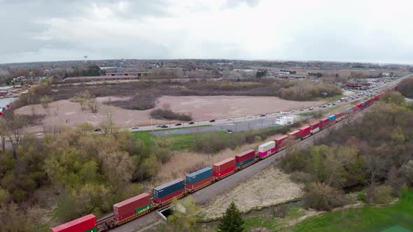 Locomotive with Freight Railway Wagon Rides on Railroad