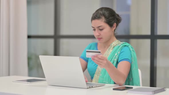 Indian Woman Making Successful Online Payment on Laptop