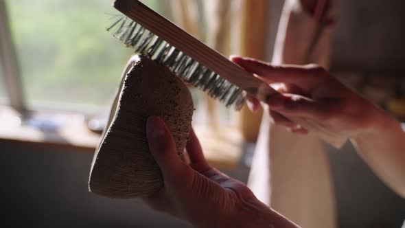 Craftsperson Texturing Handmade Ceramic Bowl