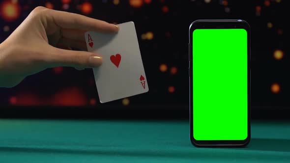 Ace of Hearts Near Green Screen Smartphone, Winning Combination, Online Casino