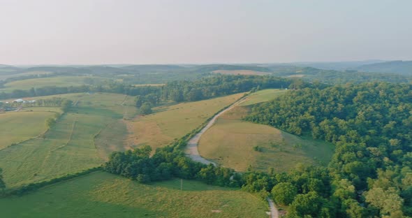 In Pennsylvania USA a Small Town is Seen Through an Aerial View of Trees at the Edge of a Meadow