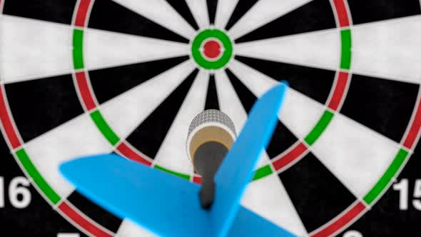 Camera Following Dart Arrow Hitting Bullseye of the Target Slow Motion Close-up