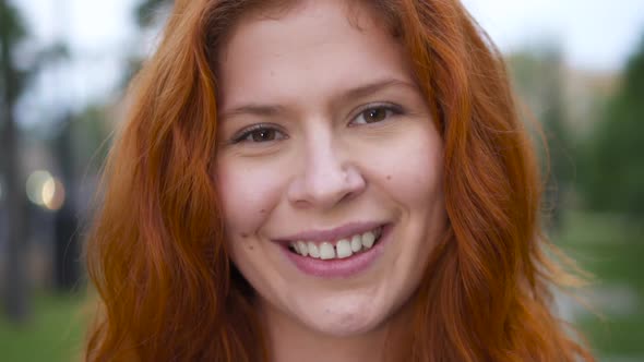 Red-haired Girl Portrait  Young Woman Smiling 