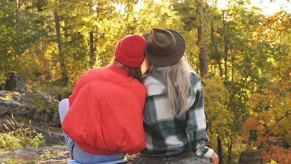 Two Happy Female Travellers Enjoy in Nature