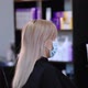 Hands of a hairdresser in rubber hair blow dry a blonde - VideoHive Item for Sale