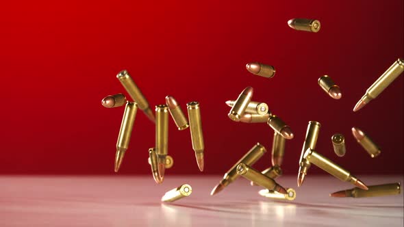 Bullets falling bouncing in ultra slow motion 1500fps on a reflective surface - BULLETS PHANTOM 