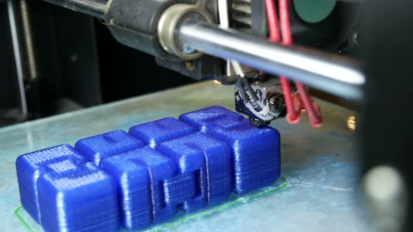 3d Printer In The Factory Prints A Plastic Product