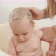 Cute Baby Boy Playing with Toy Boats While Mother Washing His Head with Shampoo - VideoHive Item for Sale