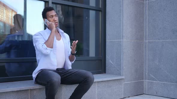 Attending Phone Call, Talking while Sitting Outdoor
