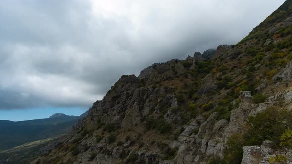 Time-lapse footage of clouds above gorgeous mountains