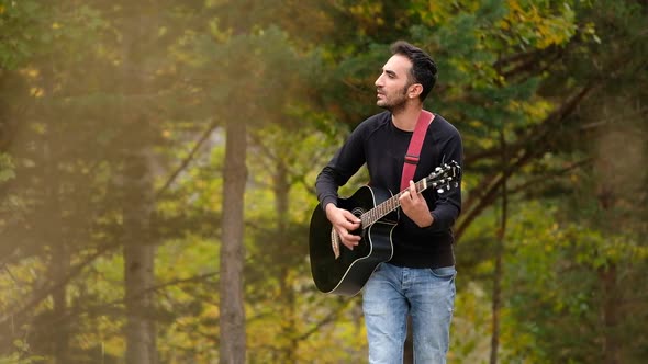 Man Sings In The Autumn Forest