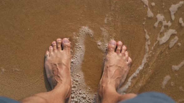Beach Travel Man Walking Wave Ocean Sand Beach Leaving Footprints in the Sand