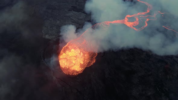 View From Above Inside Fagradalsfjall Volcano In Iceland Spewing Hot Lava During Eruption. aerial dr