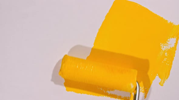 Yellow Acrylic Paint on a White Background