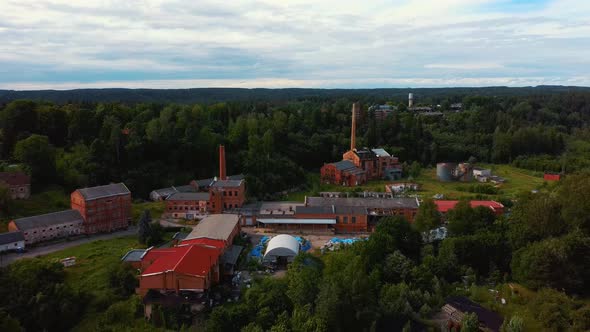 Old Ligatne Paper Mill Village From Above in Ligatne, Latvia. Aerial Dron Shot 4K Video