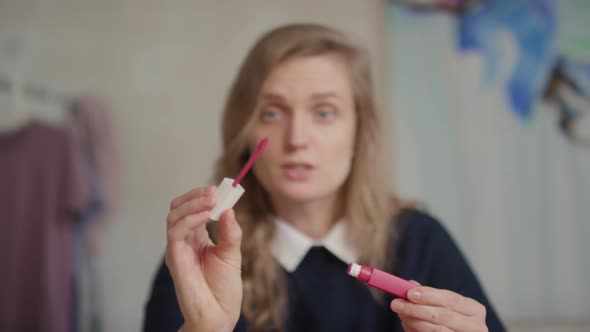 Make-Up Artist Holding Pink Lipstick