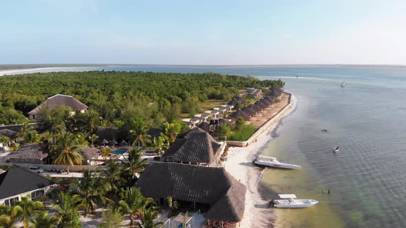 Paradise Coast Resort with Palm Trees and Hotels By Ocean Zanzibar Aerial View