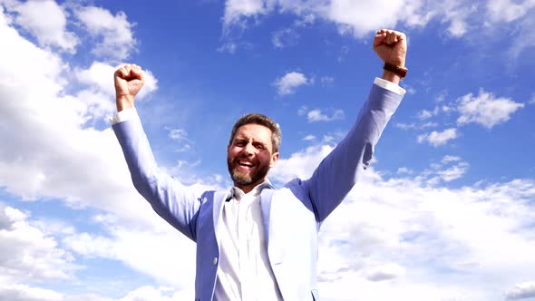 Happy Professional Guy Scream Making Winning Gesture on Sky Victory