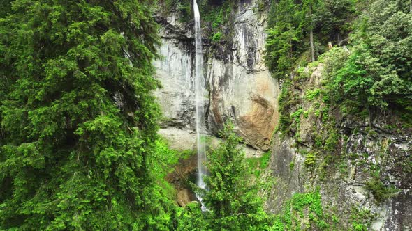 Beautiful Summer Waterfall in the Forest Magical Morning Nature Landscape in Sunny Weather Aerial