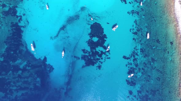 Shot from above of yachts and sailing boats at Dalmatian bay