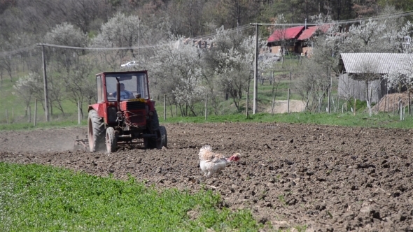 Tractor Plowing a Field 03