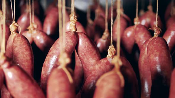 Sausages Are Being Smoked on a Rack at Meat Plant.