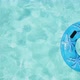 Man Swimming in Pool with Inflatable Ring - VideoHive Item for Sale
