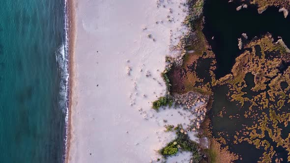 Aerial flies in Birdview over Iztuzu Beach during Sunset, Turkey.