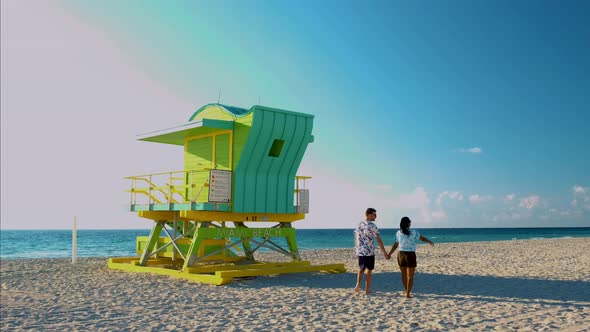 Miami South Beach Sunrise with Lifeguard Tower and Coastline with Colorful Cloud and Blue Sky South