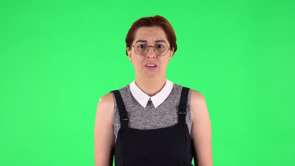 Portrait of Funny Girl in Round Glasses Frustrated Saying Wow, Green Screen