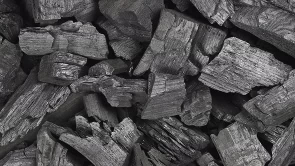 Background texture of many black charcoal pieces