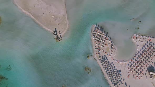 drove aerial view over Elafonissi beach lagoon blue turquoise water Crete