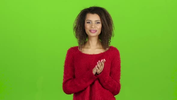 Afro American Woman Smiles and Clapping, Green Screen. Slow Motion