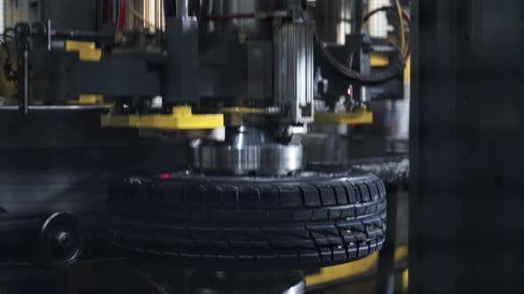 Automobile Tyre Stamping Conveyor Working Process at Automotive Modern Workshop