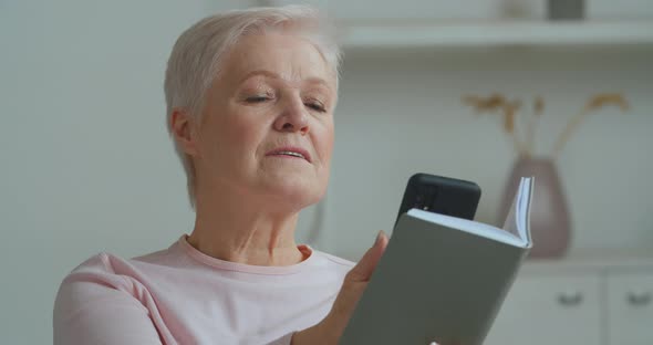 Old Caucasian Woman Grayhaired Elderly Mature Lady Sitting at Home Reading Book Refuses Literature