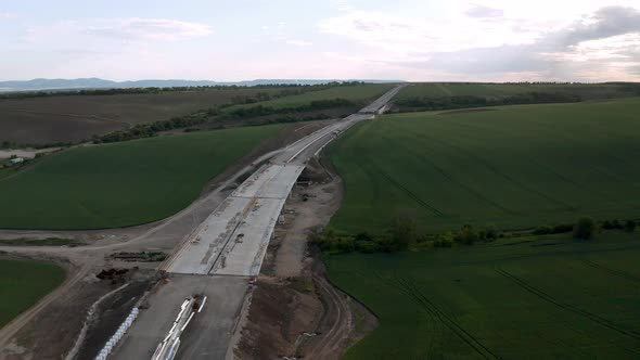 Drone flight over beautiful nature and a newly built highway