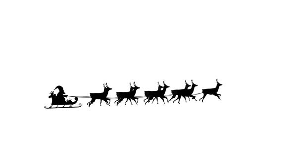 Santa Claus in sleigh pulled by reindeers