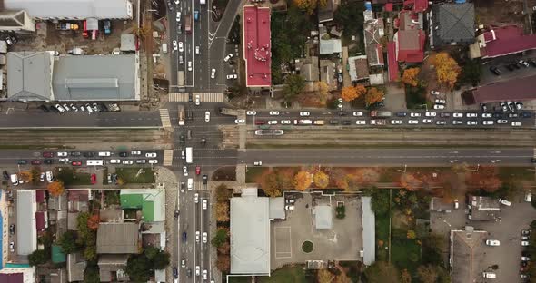 Top Down Drone Point of View - Steet City Road Intersection in Autumn Time