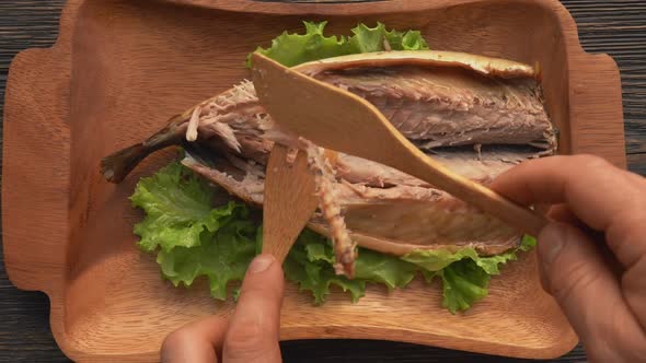 Top View of the Bamboo Fork Takes a Spine From Delicious Grilled Mackerel Fish