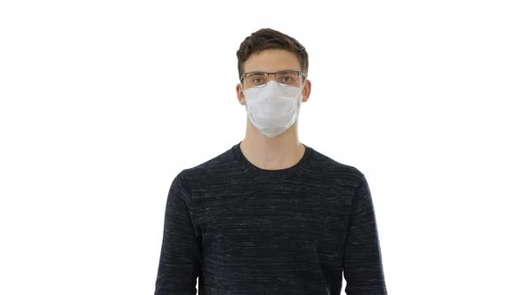 Student in Antiviral Mask Walking on White Background